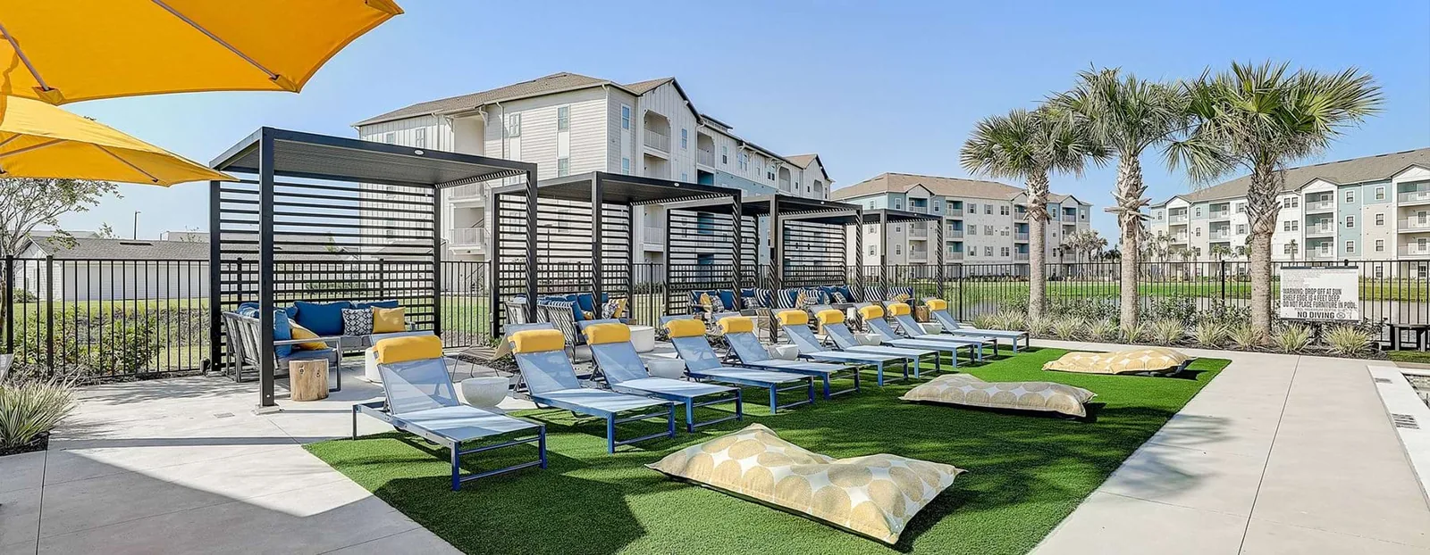 Completed pool and exterior community setting at Atlas at the Loop