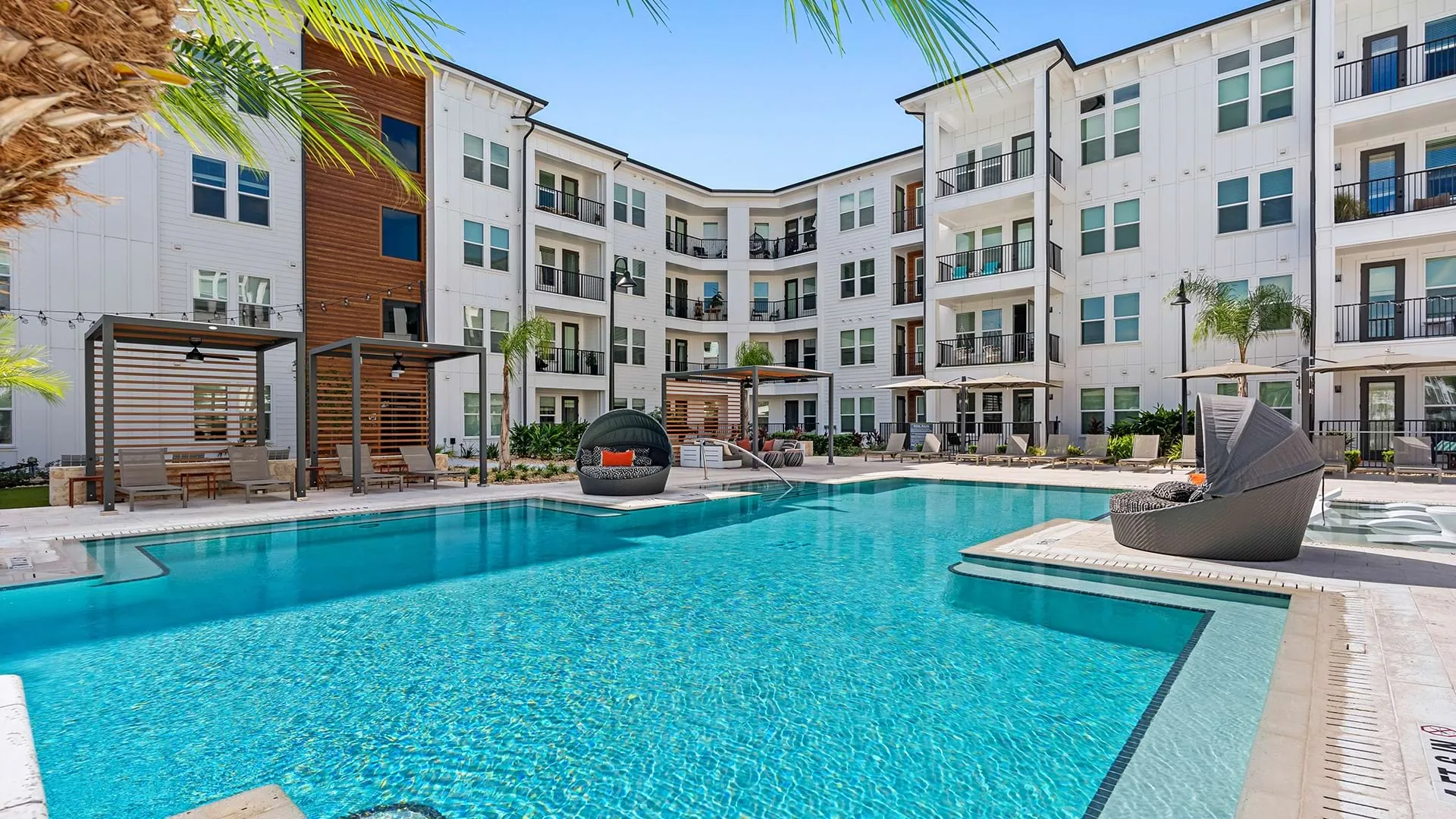 Exterior and pool at Cortland Riverview in Riverview, Florida