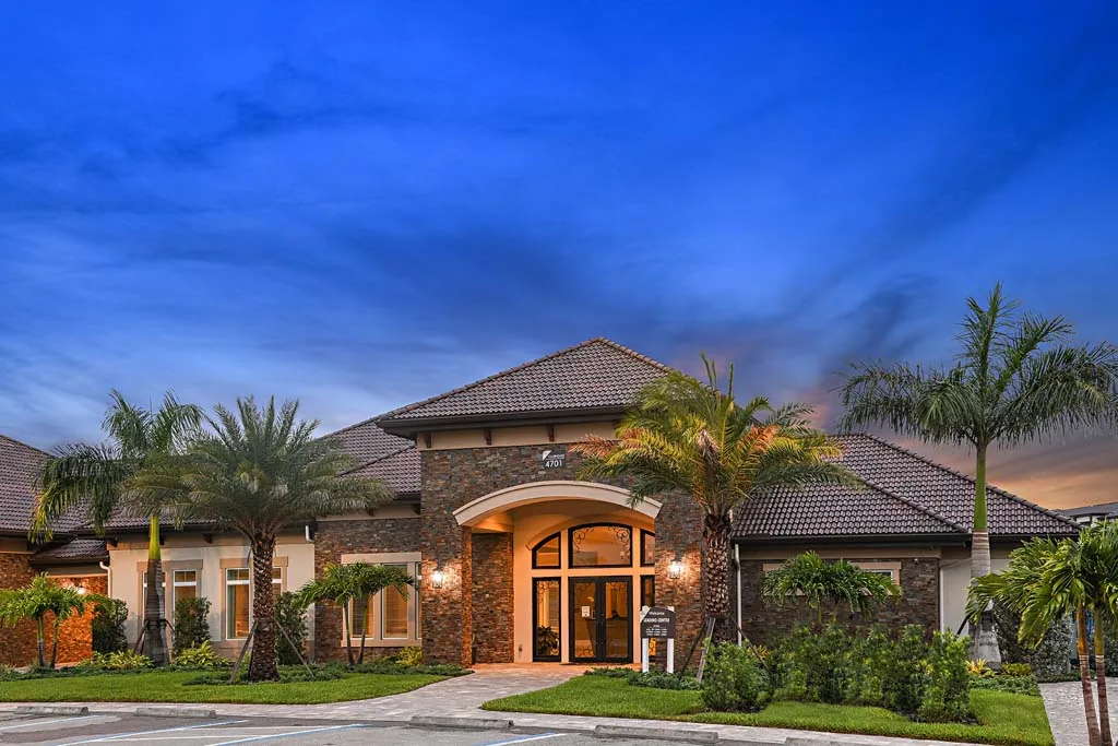 Clubhouse exterior at Oasis at Cypress Woods in Fort Myers, Florida