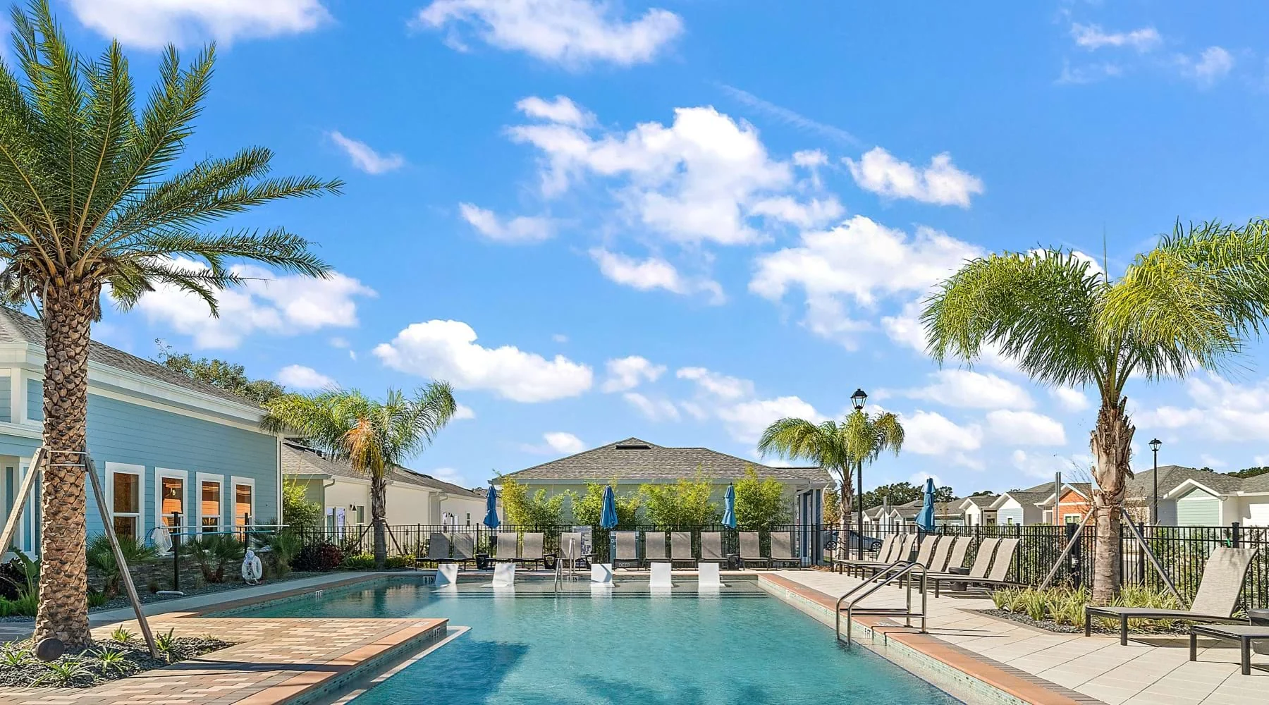 Resort-style pool and completed community setting at Solamar Wildwood