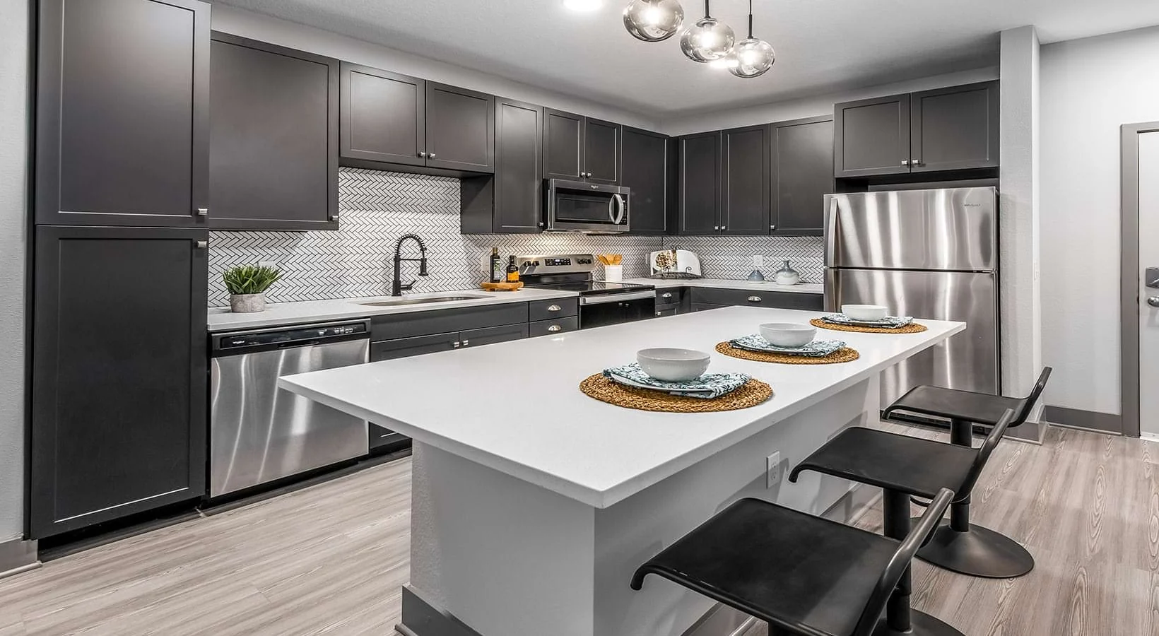 Modern kitchen with stainless steel appliances at The Westerly